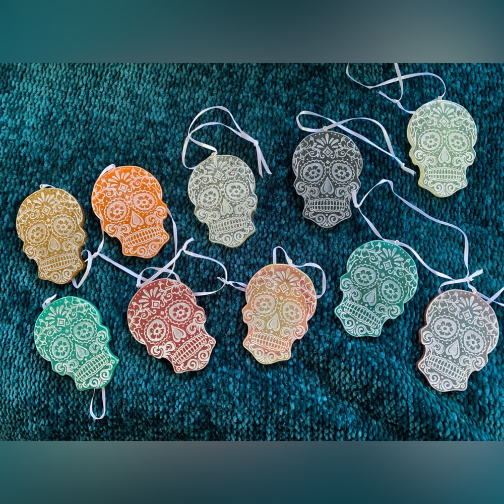 lot of day of the dead sugar skulls